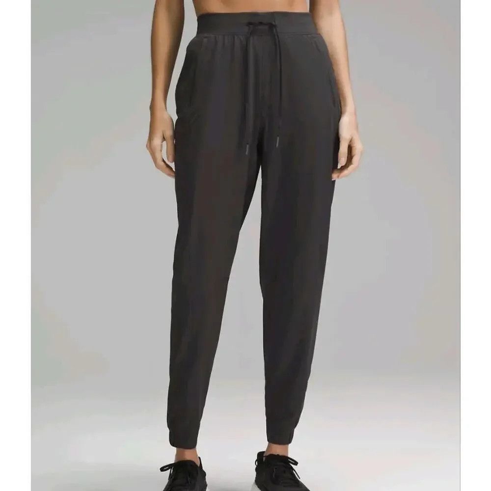 Lululemon License to Train High-Rise Pants 8 Black Zip Pockets Drawstring Cuff